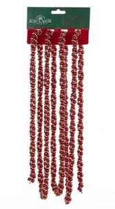 Christmas garlands decorated with red velvet bows, isolated on white. Christmas Tree Garland Red Gold Twist Garland 9ft