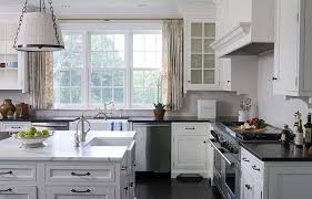This modern kitchen idea is mostly white but it contains touches of neutrals for colour and warmth. Neutral Rooms In Black White Blue And Beige South Shore Decorating Blog Kitchen Design Marble Countertops Kitchen Home Kitchens