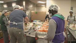 hosea helps prepares to feed hundreds