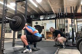 powerlifters coaching novices