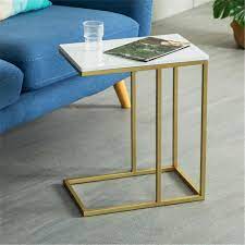 marble side table c shaped couch laptop