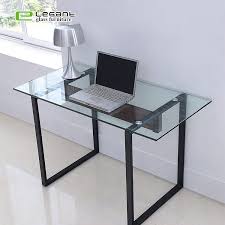 More than just a spot to work, this 29.25'' h x 47.25'' w x 23.75'' d writing desk lends modern appeal to your den or office. China Clear Tempered Glass Top Office Computer Desk With Metal Leg China Office Desk Glass Table