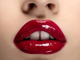 beautiful woman lips with red lipstick