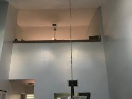 Bronze Recessed Lighting On White Ceiling