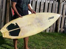 steps to refurbish an old surfboard