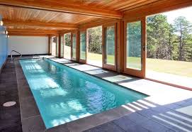 An indoor pool is quickly becoming popular a popular addition to homes. 20 Incredible Indoor Pool Designs Indoor Swimming Pool Design Indoor Pool Design Small Indoor Pool
