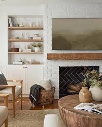 White Painted Brick Fireplace With Oak