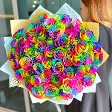rainbow roses bouquet by deflora llc
