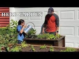Planting A Raised Bed Herb Garden With