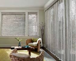 Roman And Woven Wood Shades Window