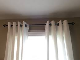 how to hang grommet curtains storables