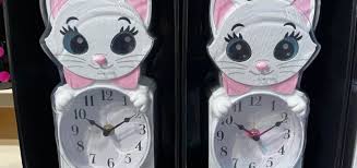 New Marie Wall Clock Scurries Into The
