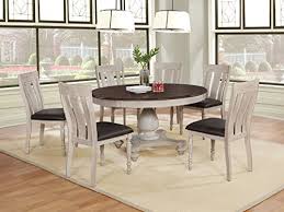 Its rounded top is crafted with a rustic finish, while the pedestal base features striped detailing for a hint of intrigue. Roundhill Furniture Arch Solid Wood Dining Set Round Table Six Chairs Distressed White And Dark Oak Buy Online In Gibraltar At Gibraltar Desertcart Com Productid 138612525
