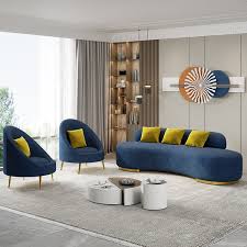 blue velvet upholstered curved sofa