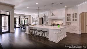 kitchen white cabinets dark wood floors