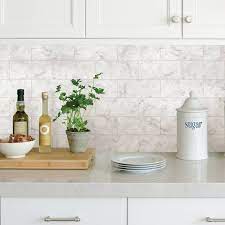 This peel and stick wallpaper is easy to use and won't harm your walls. Brewster Marble Tile Peel Stick Backsplash White Peel Stick Backsplash Wallpaper Backsplash Kitchen Backsplash