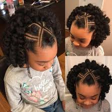 Another simple yet stylish hairstyle for those little girls who have long curly black hair but are looking to style their hair differently from the usual dreadlocks hairstyle or braided. 17 Young Black Queens Whose Incredible Hairstyles Will Definitely Make You Say Goals Natural Hair Styles Lil Girl Hairstyles Kids Hairstyles
