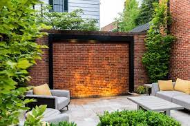 outdoor sitting area with brick wall
