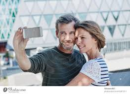 happy couple taking a selfie
