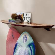 You can place it on a shelf or lean against a wall to add a touch of the ocean to your home.the modern wave design on the board adds a touch of elegance to the overall coastal look of the surfboard. Surfboard Shelf Teen Decor Sale Pottery Barn Teen