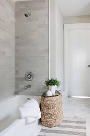 Bathtub With Staggered Gray Glass Tiles