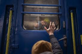 tearful goodbyes at kyiv train station