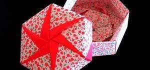 a hexagonal origami gift box