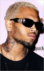 Breezy appeared earlier this month in las vegas sporting a new neck tattoo that has just now caught our attention. Chris Brown Denies Neck Tattoo Of Beaten Woman Is Rihanna S Face Chris Brown Tattoo Chris Brown Neck Tattoo Chris Brown