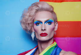 makeup holding lgbt pride flag against