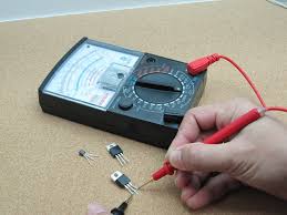to discharge a capacitor with a multimeter