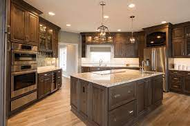 Traditional kitchens are for those who want their house to feel as if a standard or country home. Traditional Kitchen Remodel In Indiana Stained Cabinets Pendant Lights Wood Floors Kitchen Remodel Traditional Kitchen Remodel Kitchen Remodeling Services