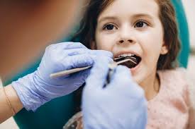 The american dental association has chosen 2021's campaign slogan to be water: Premium Photo Dentist And Nurse Examining A Young Patient With Tools