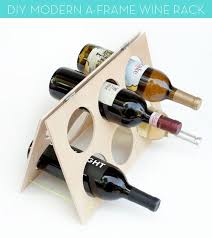 The flexibility offered in this diy wine rack plan allows you to use pipes as per the interiors of the room. Make It A Modern Diy A Frame Wine Rack Wine Rack Plans Diy Wine Rack Diy Wine