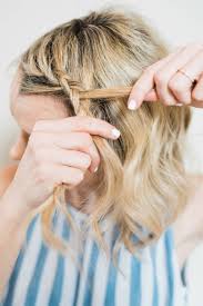 Braids add glamour to any hairstyle and when fused with a start braiding your hair by crossing the left section over the middle section and the right section over the new middle section. How To Do An Easy Side Braid Ponytail Beauty Poor Little It Girl