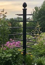 Unusual Metal Garden Obelisk Adorned