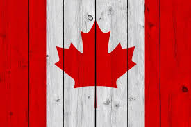 Canada Flag Painted On Old Wood Plank