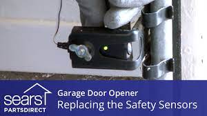 safety sensors on a garage door opener