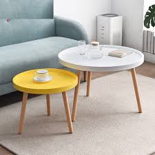 A coffee table set will usually include a larger coffee table that you can put in front of your sofa along with one or two smaller end tables. Solid Wood Modern Side Table Small Round Tea Table Sets Coffee Tables Indoor Living Room Furniture Coffee Tables Aliexpress