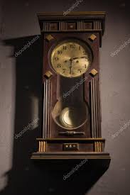 Grandfather Clock Hanging On A Wall