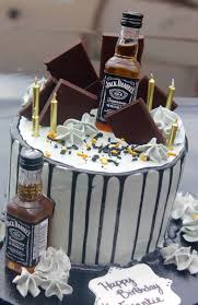 It's made with yellow cake mix, liquor and chocolate. Jack Daniels Cake Alcohol Birthday Cake 21st Birthday Cakes Jack Daniels Cake