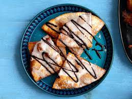 fried tortillas with chocolate sauce