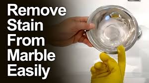remove stain from white marble without