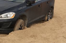 Car stuck in mud how to get out. What To Do If Your Car Is Stuck In Sand Fix Auto Usa