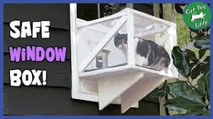 This cat window seat is amazing!! Window Catios Cat Window Boxes Catio World