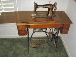 Most early full size machines were normally operated. Antique Singer Sewing Machine In Cabinet