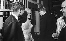 Kennedy died — shot and killed on the wet cement . Was Marilyn Monroe Killed Over This Jfk Secret
