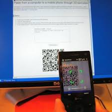 a mobile phone scanning a qr code from
