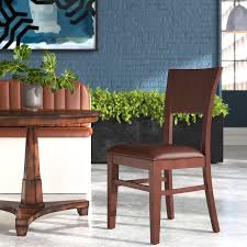 It has a solid back for added sitting comfort. H D Restaurant Supply Inc Solid Wood Dining Chair Wayfair