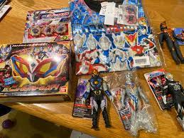 Recent haul for my son and I. Mostly Ultraman Z (including coins for the Z  Riser + Taiga movie. The T shirt comes with R/B coin. : r/Ultraman