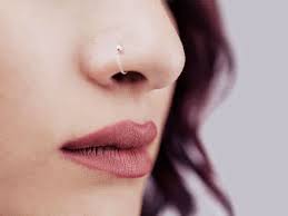 infected lip piercing symptoms